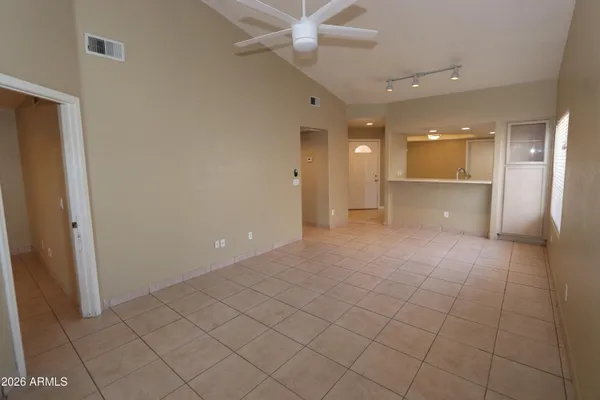 a view of an empty room and window