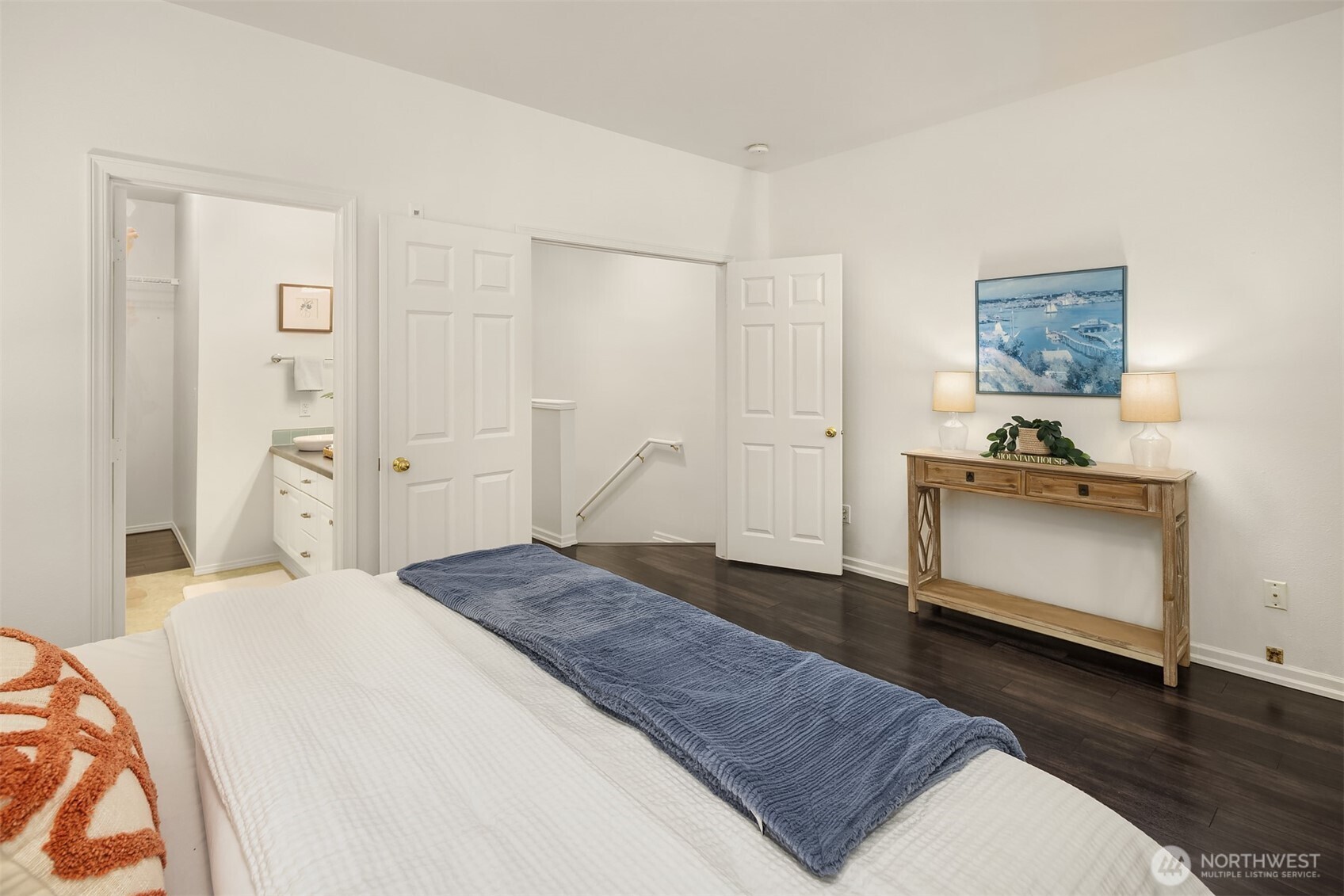 1800 Northeast 40th Street, Unit C1 Renton, WA 98056 - Photo 15 of 23 a bedroom with a bed and a view of bathroom