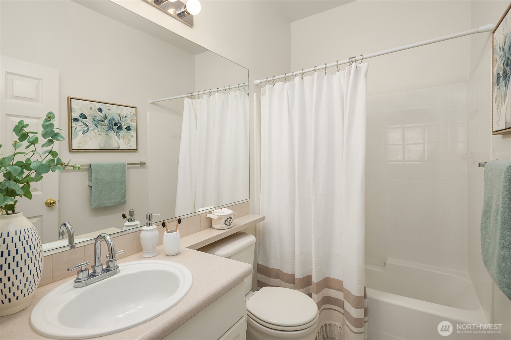 1800 Northeast 40th Street, Unit C1 Renton, WA 98056 - Photo 18 of 23 a bathroom with a sink toilet and shower
