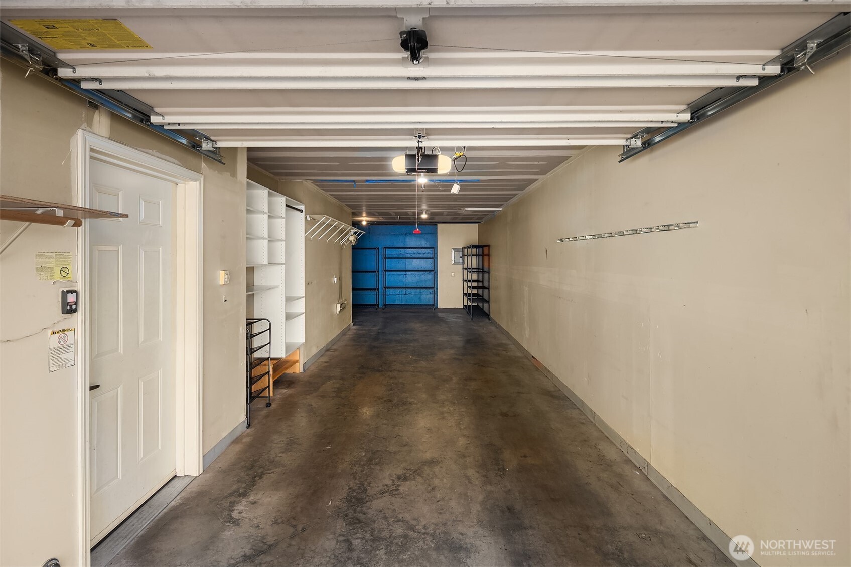 1800 Northeast 40th Street, Unit C1 Renton, WA 98056 - Photo 20 of 23 a view of a hallway with wooden walls and stairs