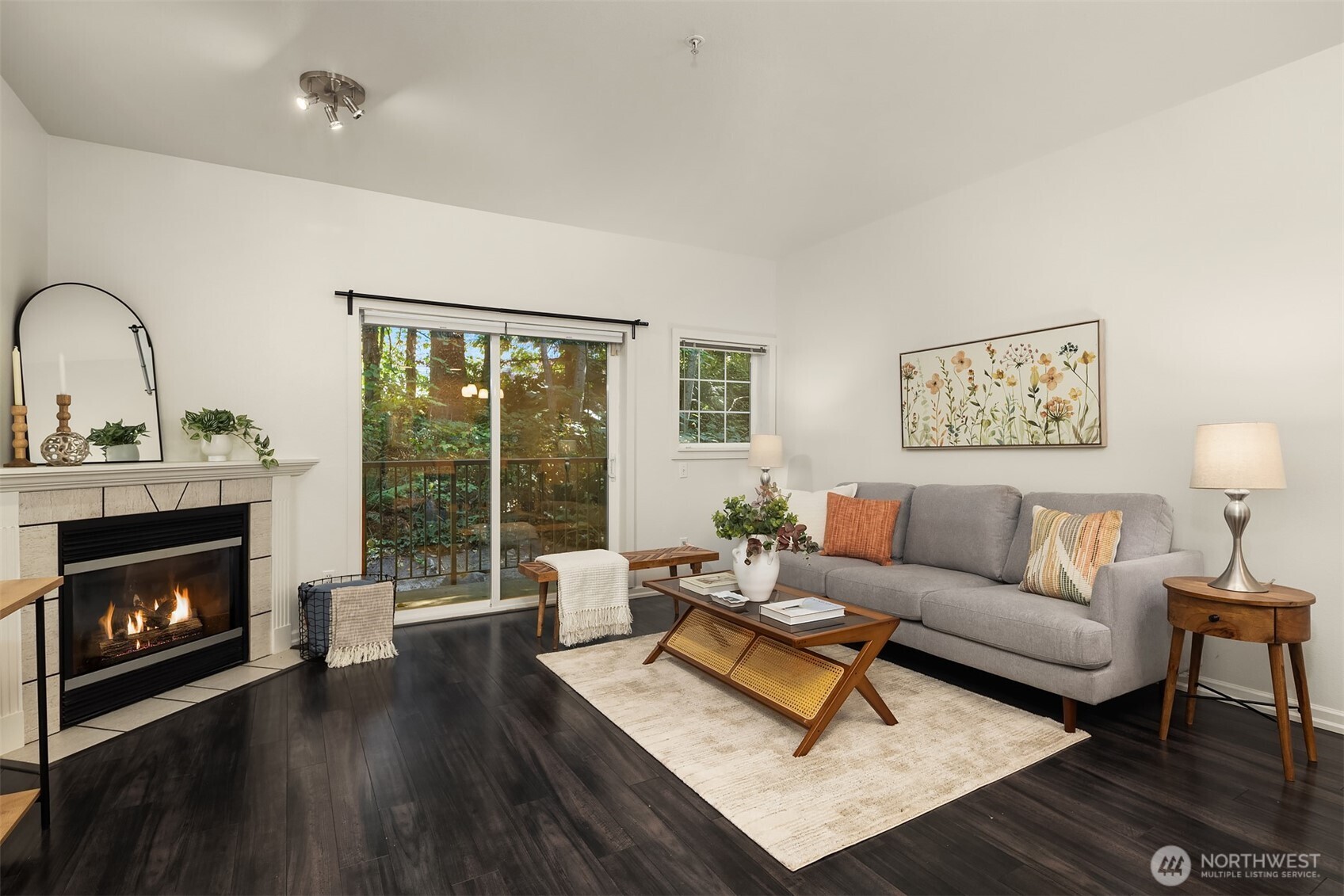 1800 Northeast 40th Street, Unit C1 Renton, WA 98056 - Photo 2 of 23 a living room with furniture and a fireplace