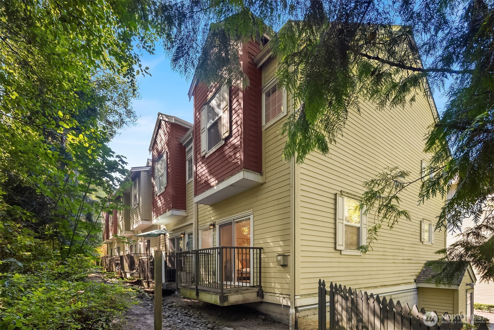 1800 Northeast 40th Street, Unit C1 Renton, WA 98056 - Photo 22 of 23 a view of a street with a house