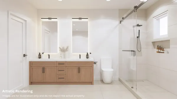 a bathroom with a double vanity sink toilet and shower