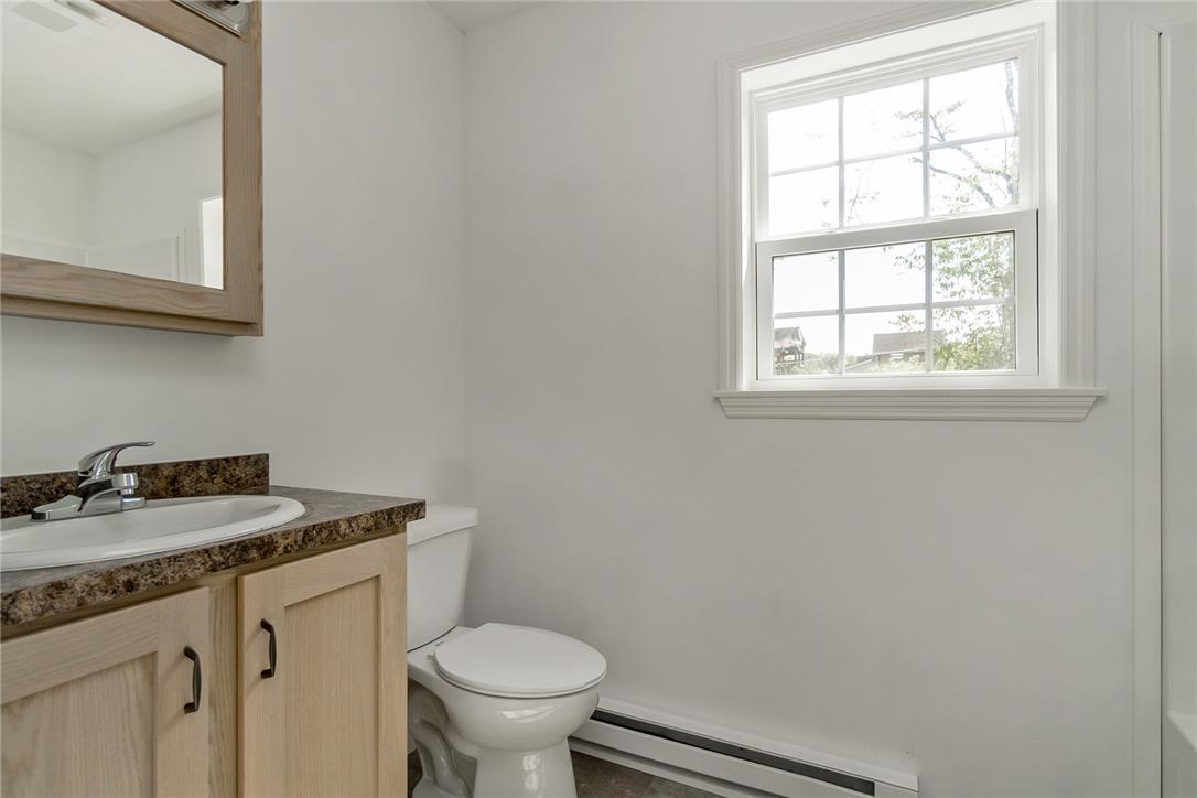 624 Main Road Lehighton, PA 18235 - Photo 27 of 42 A well-lit bathroom with a vanity and window for natural illumination.