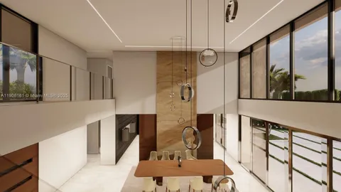 a dining room with a table and chairs