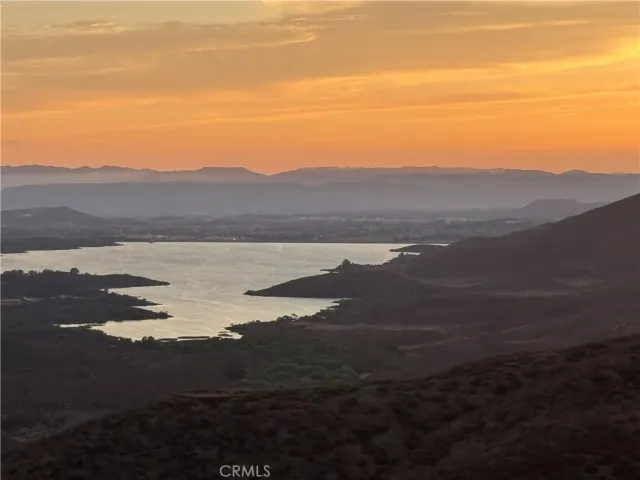a view of lake with mountain
