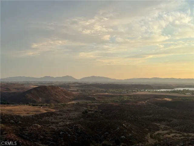 a view of mountain with lake view