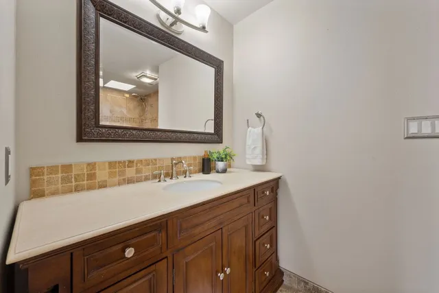 a bathroom with a shower and a toilet