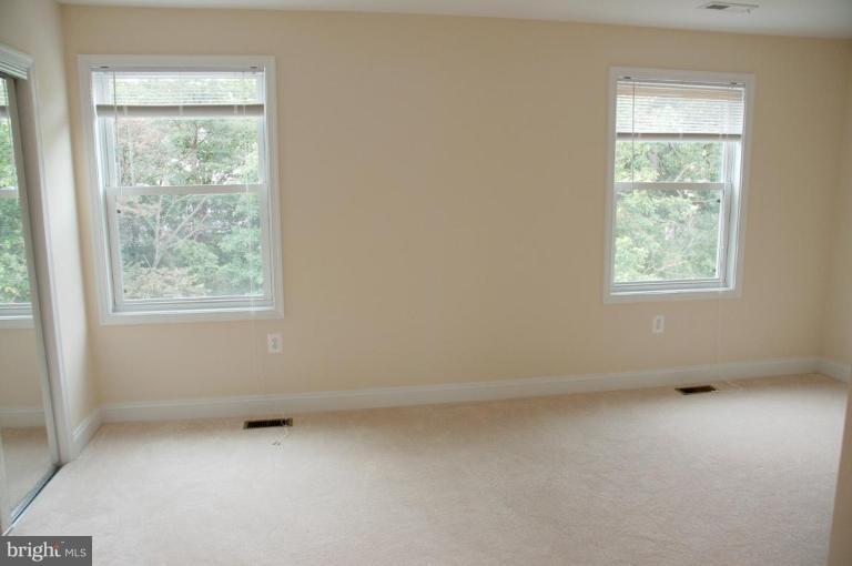73 Timber Rock Road Gaithersburg, MD 20878 - Photo 18 of 25 Master bedroom windows