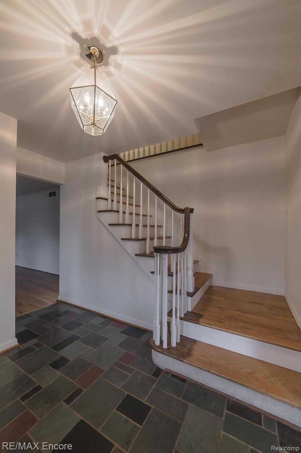 4288 Fieldbrook Road West Bloomfield, MI 48323 - Photo 5 of 49 Gorgeous staircase to upper level complete with hardwood stairs!