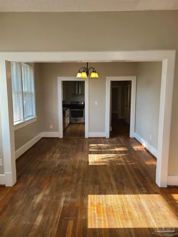 a view of an empty room and window