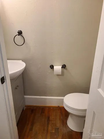a bathroom with a toilet and a sink