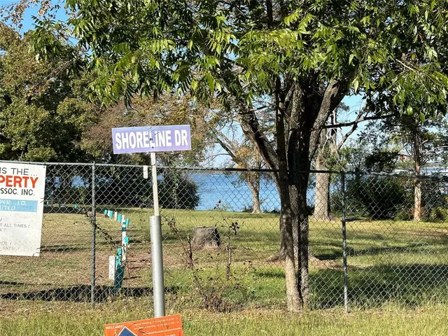 a sign that is on the side of the road