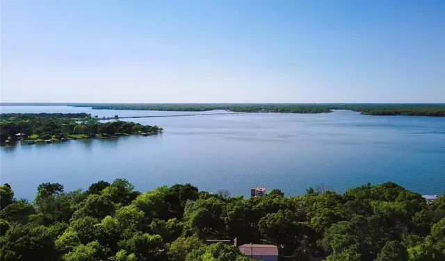 a view of a lake with a city view