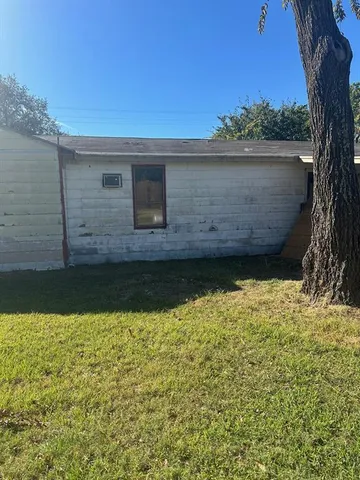 a view of a swimming pool with an outdoor space