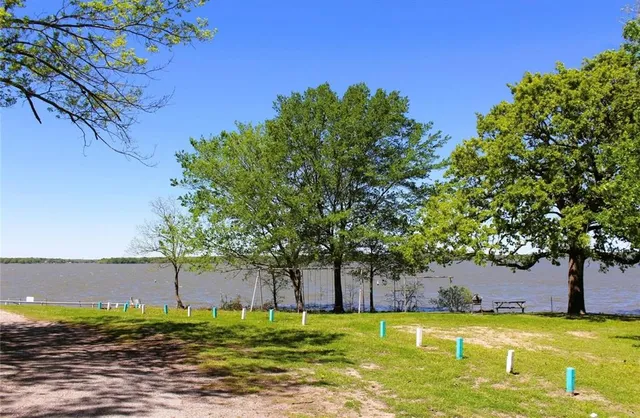 a view of a swimming pool with an outdoor space and seating area