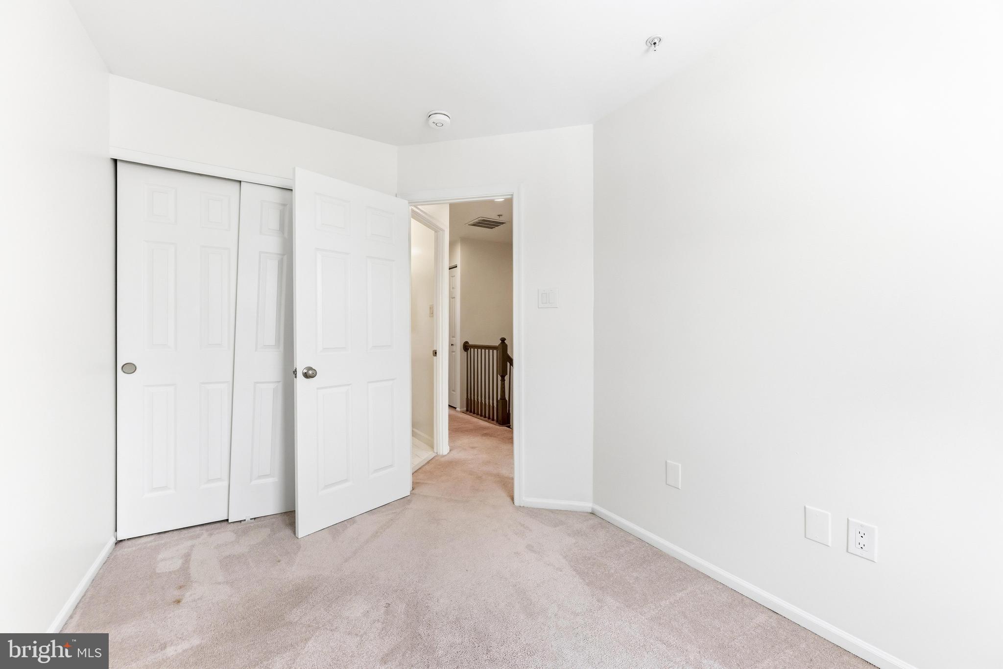 8428 Gold Sunset Way Columbia, MD 21045 - Photo 22 of 43 a view of an empty room