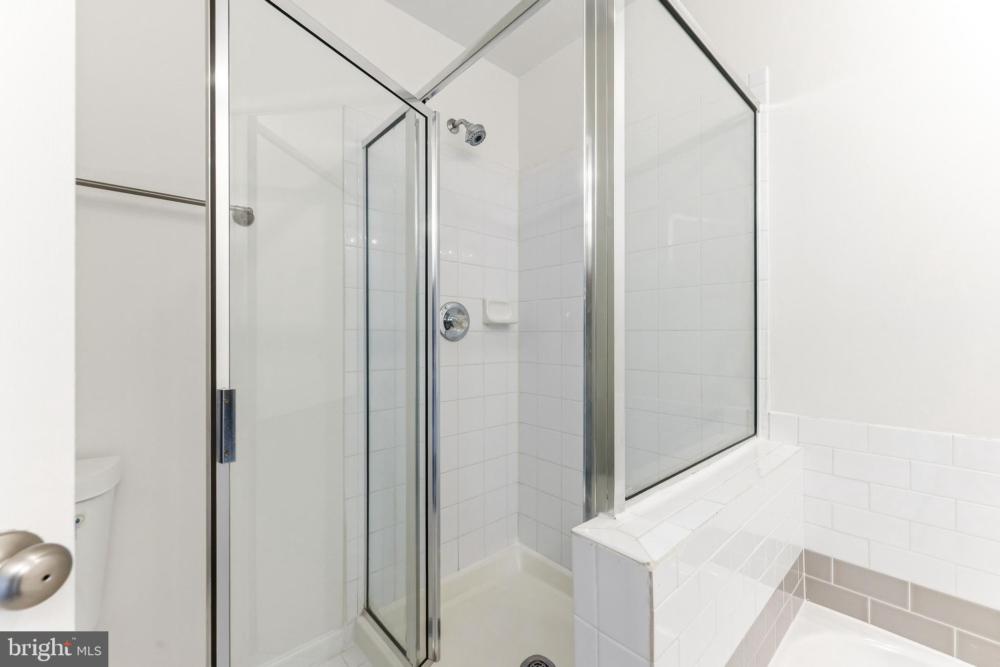 8428 Gold Sunset Way Columbia, MD 21045 - Photo 29 of 43 a bathroom with a shower and a sink