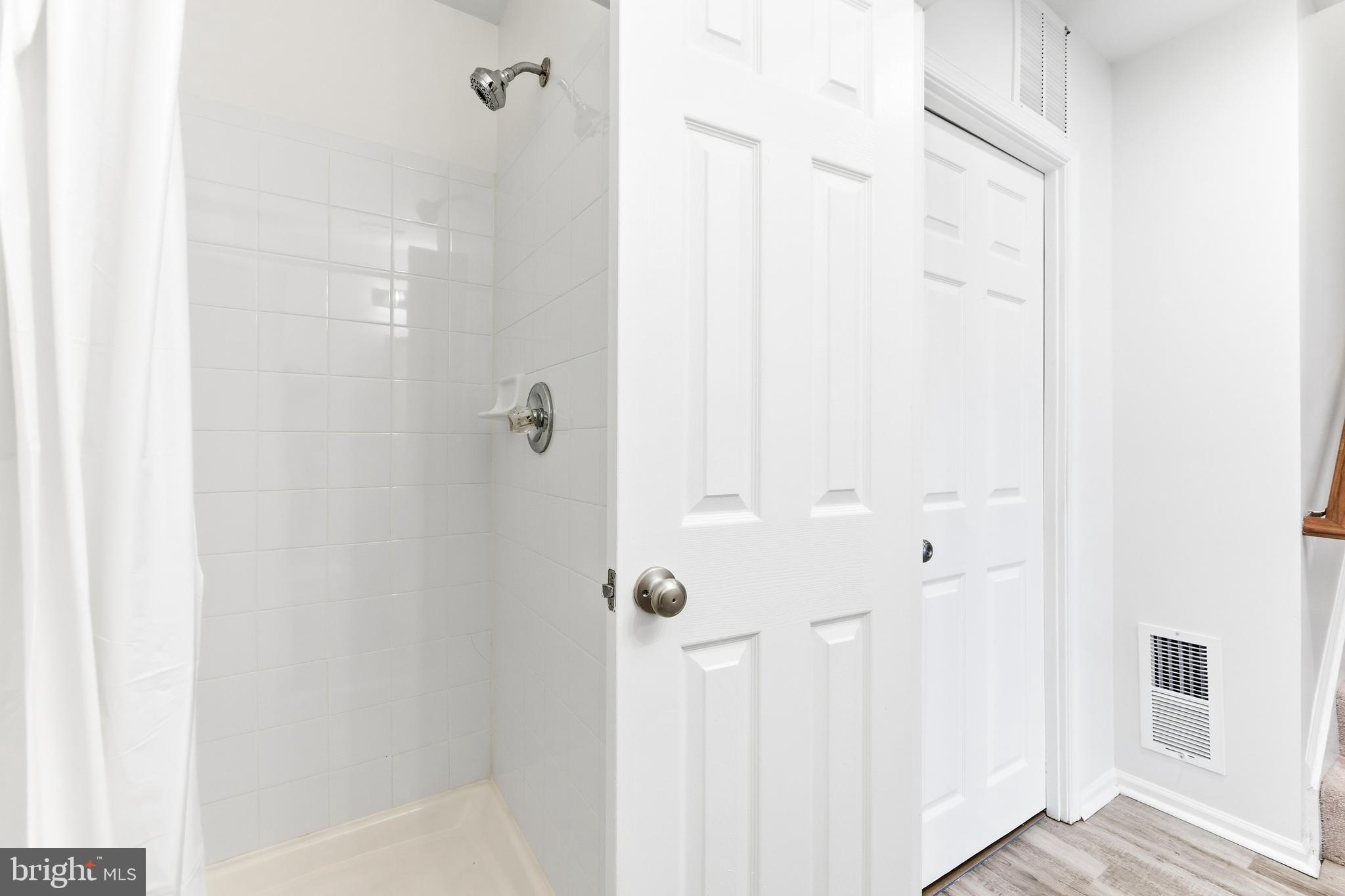 8428 Gold Sunset Way Columbia, MD 21045 - Photo 37 of 43 a bathroom with a shower