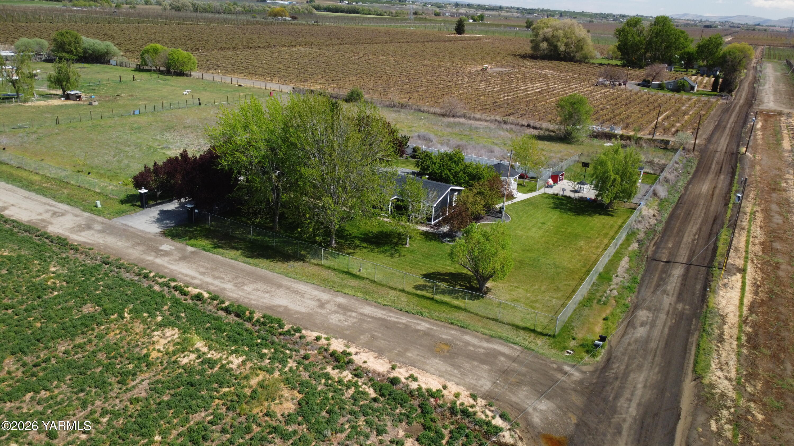 1051 County Line Mabton, WA 98935 - Photo 22 of 22 an aerial view of a houses with outdoor space