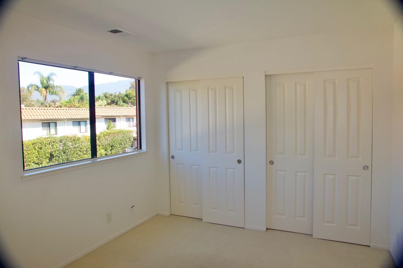 4344 Modoc Road, Unit 3 Santa Barbara, CA 93110 - Photo 7 of 8 an empty room with a window