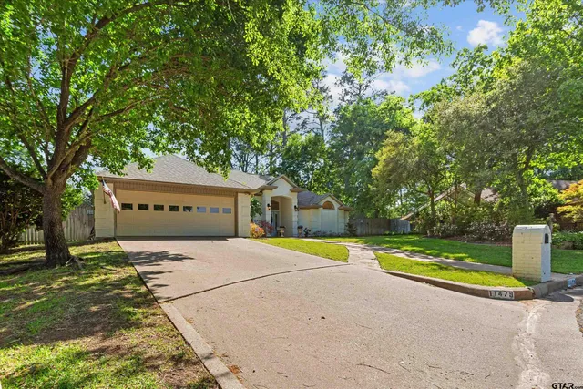 a view of swimming pool with a yard