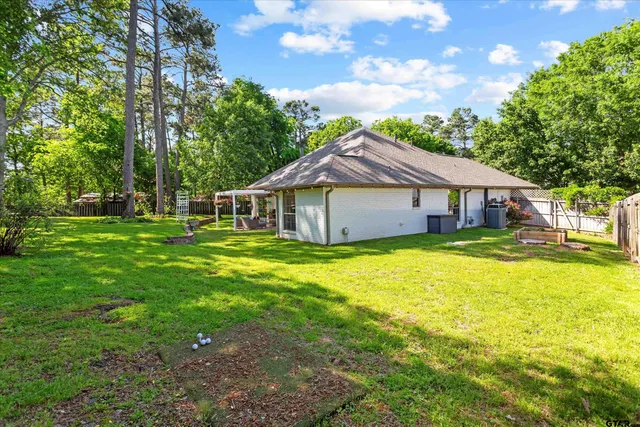 a house view with a garden space