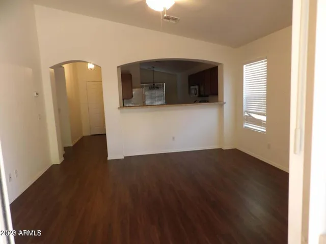 a view of a livingroom with wooden floor