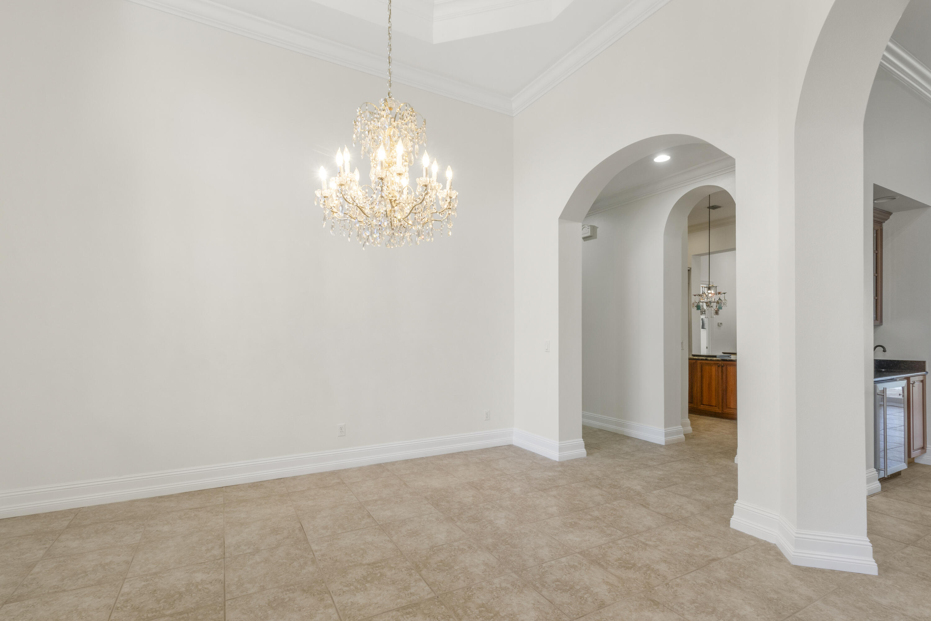 4304 Stonebridge Road Destin, FL 32541 - Photo 12 of 72 a view of a chandelier in big room and chandelier