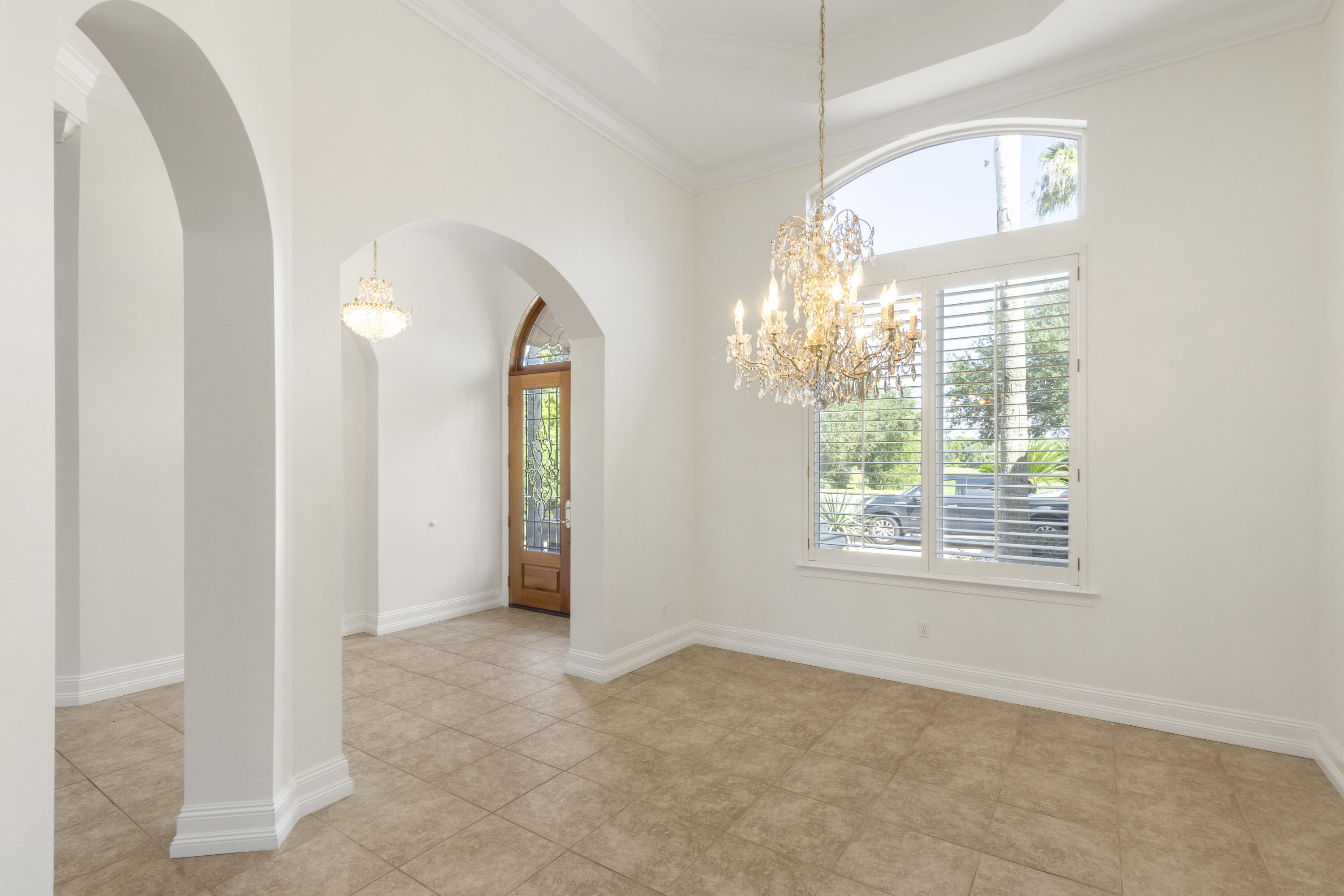 4304 Stonebridge Road Destin, FL 32541 - Photo 14 of 72 a view of an empty room with a window