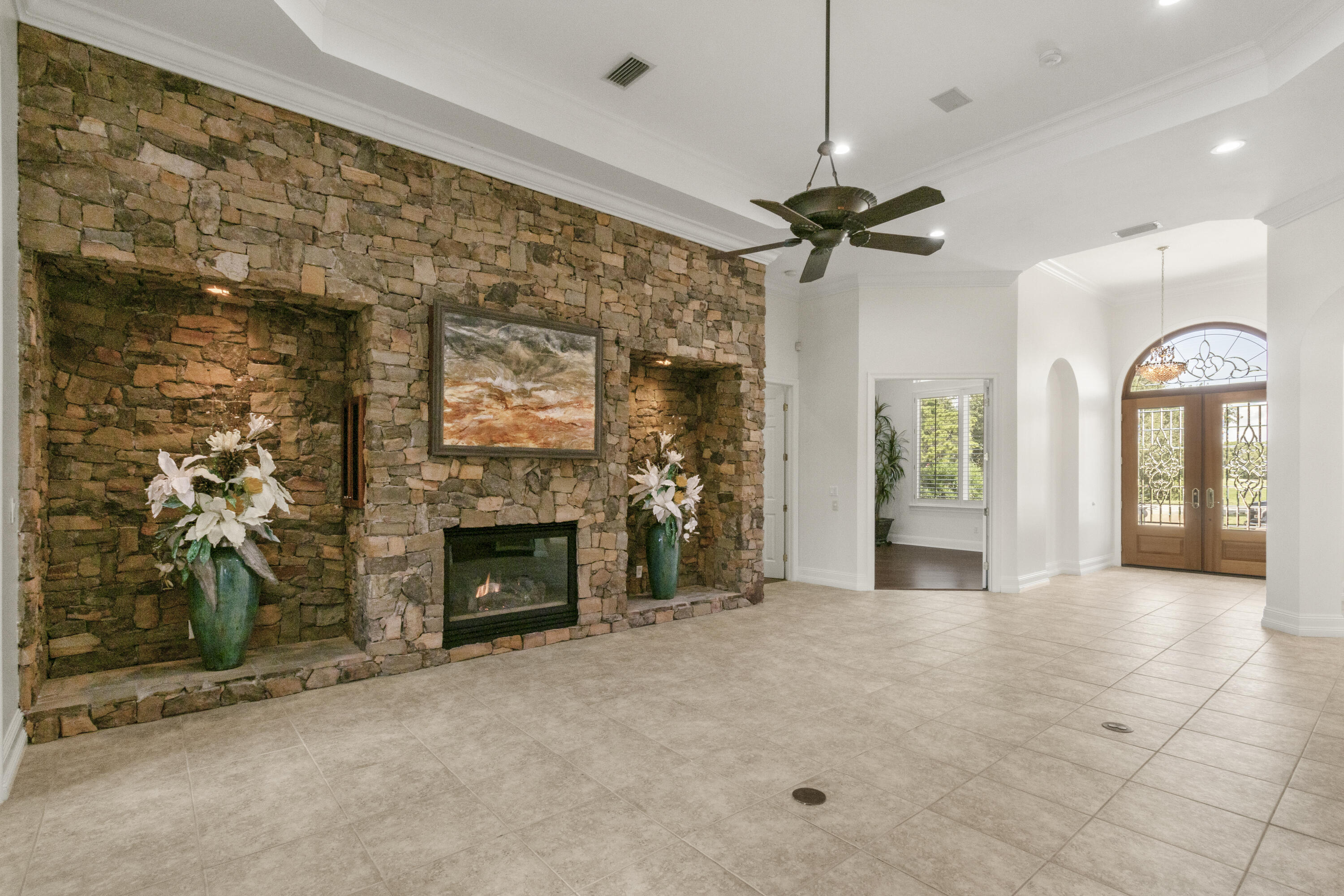 4304 Stonebridge Road Destin, FL 32541 - Photo 19 of 72 a view of a livingroom with a fireplace and window