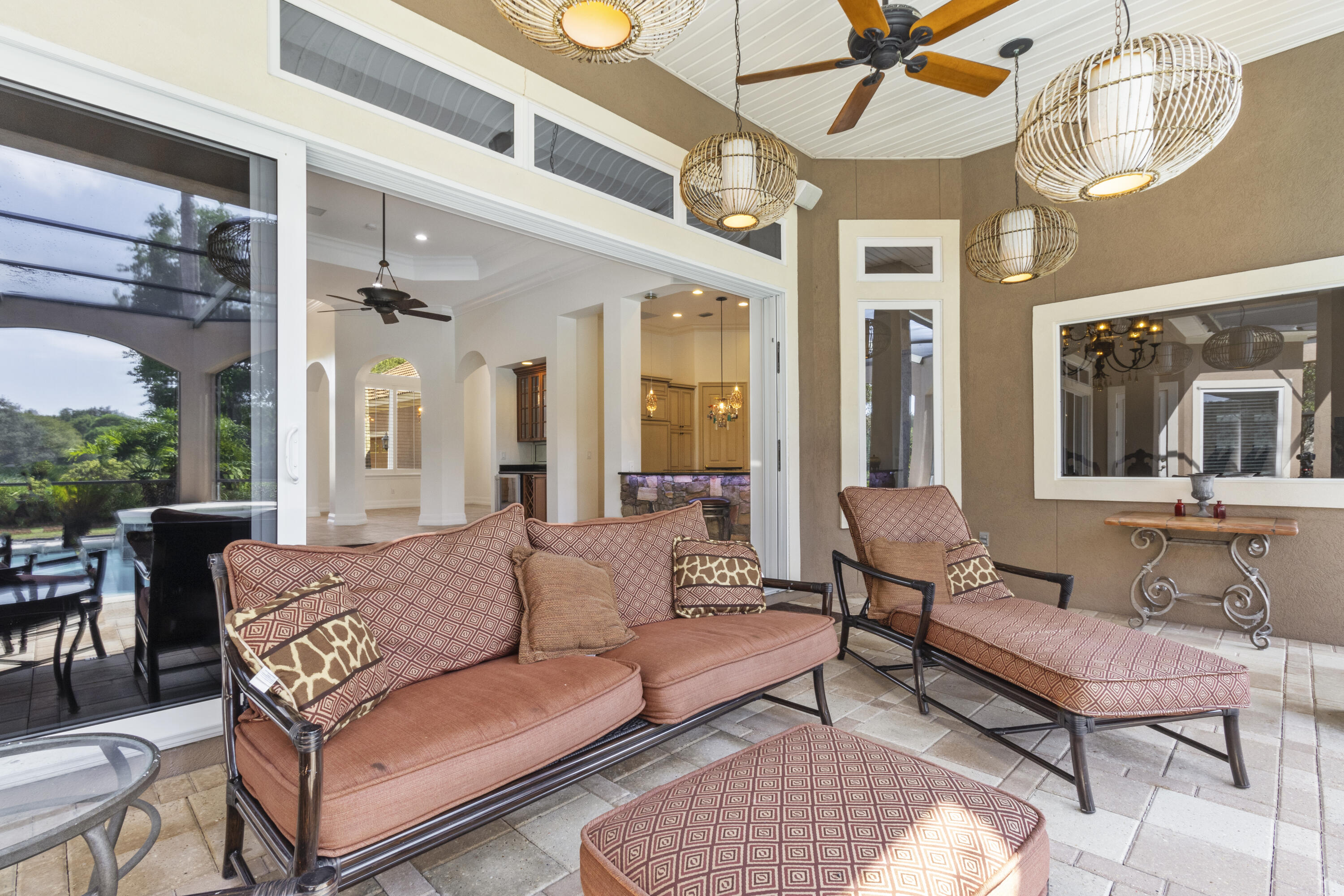 4304 Stonebridge Road Destin, FL 32541 - Photo 26 of 72 a living room with furniture and a large window