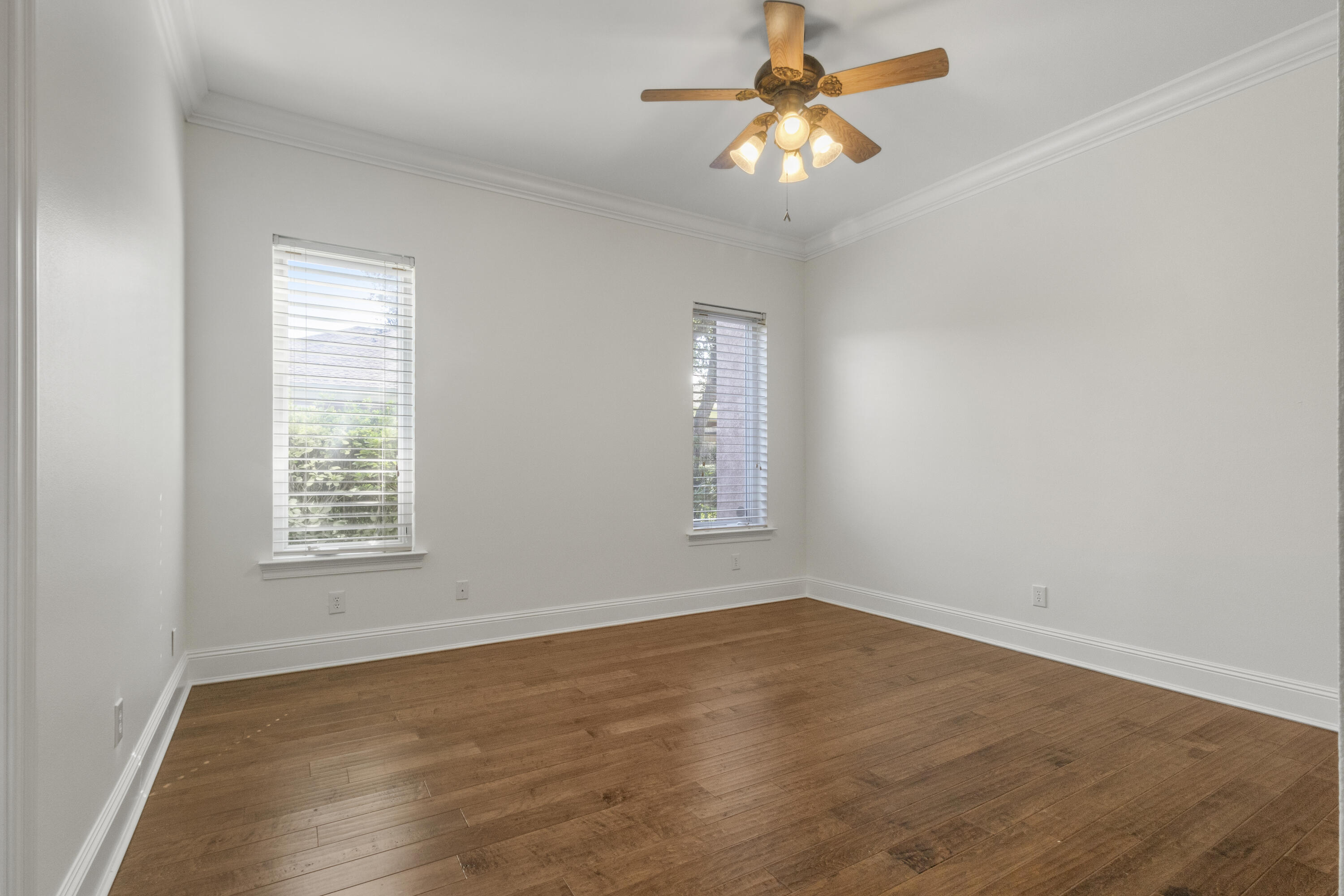 4304 Stonebridge Road Destin, FL 32541 - Photo 28 of 72 wooden floor in an empty room with a window