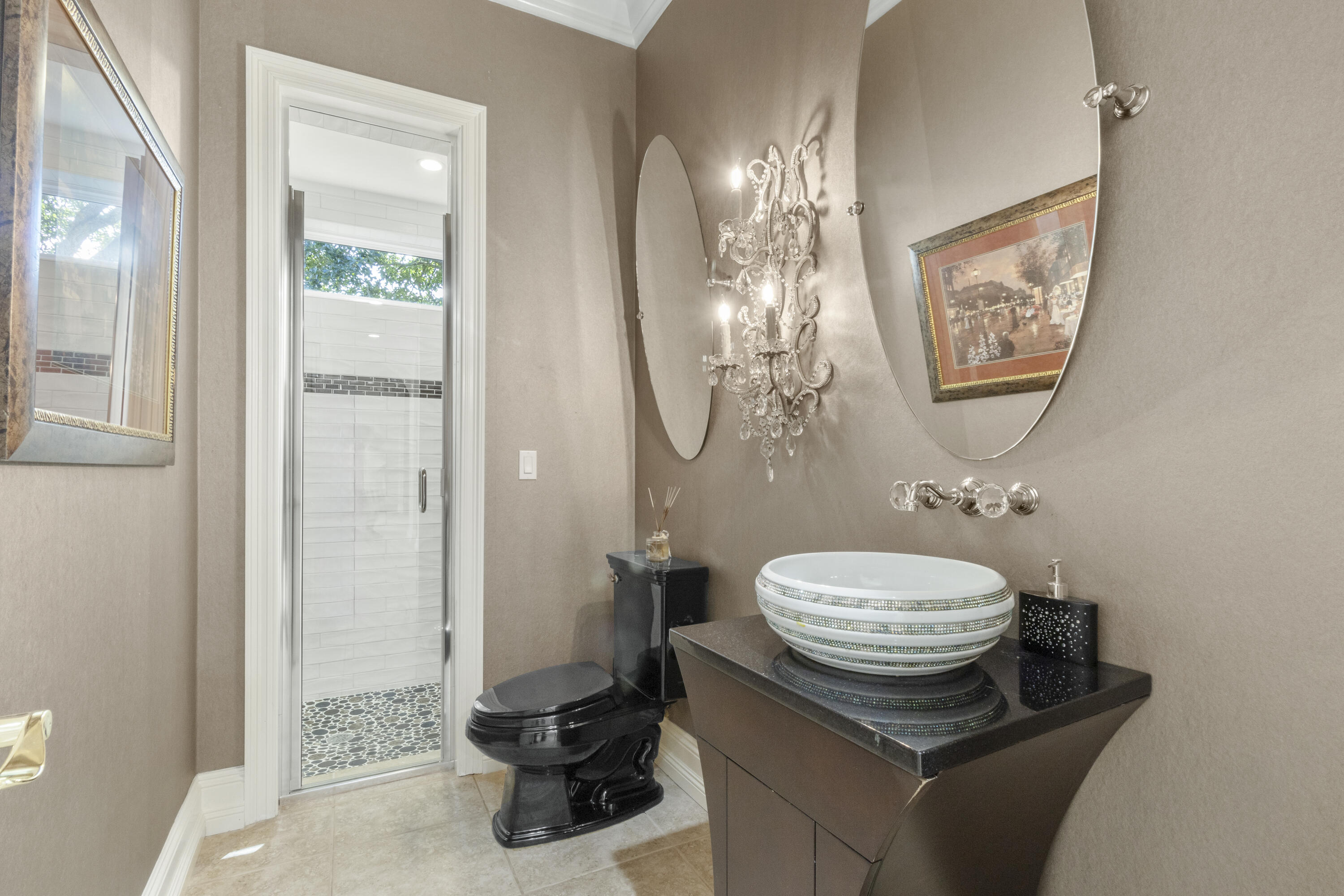 4304 Stonebridge Road Destin, FL 32541 - Photo 34 of 72 a bathroom with a sink and a mirror