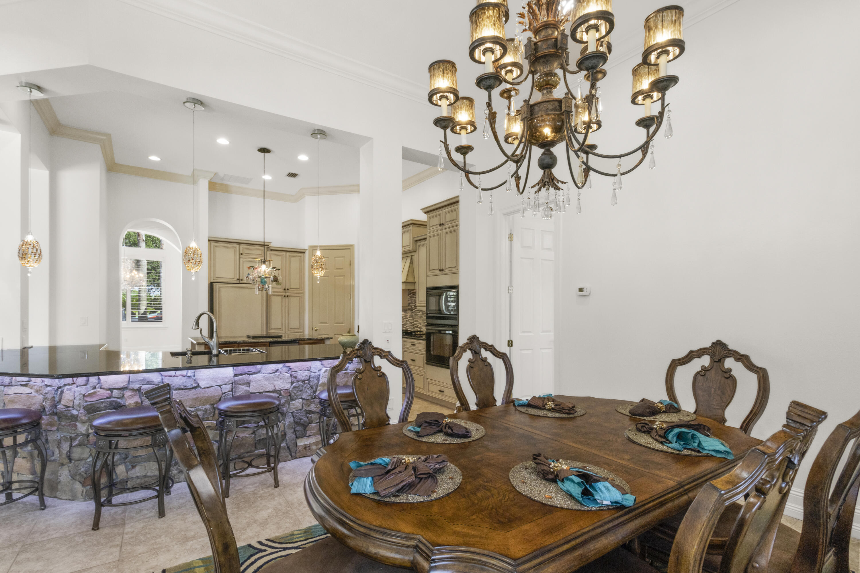 4304 Stonebridge Road Destin, FL 32541 - Photo 39 of 72 a view of a dining room with furniture