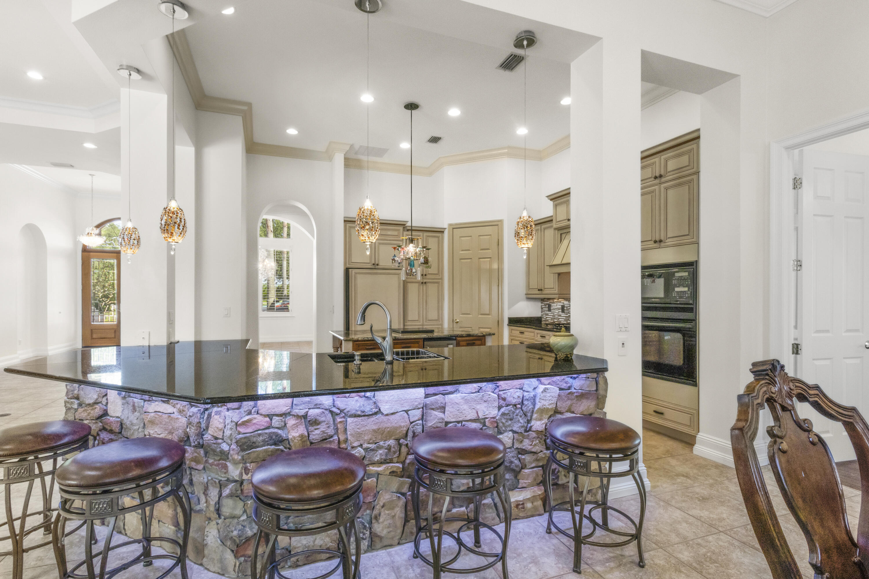 4304 Stonebridge Road Destin, FL 32541 - Photo 40 of 72 a view of a dining room with furniture