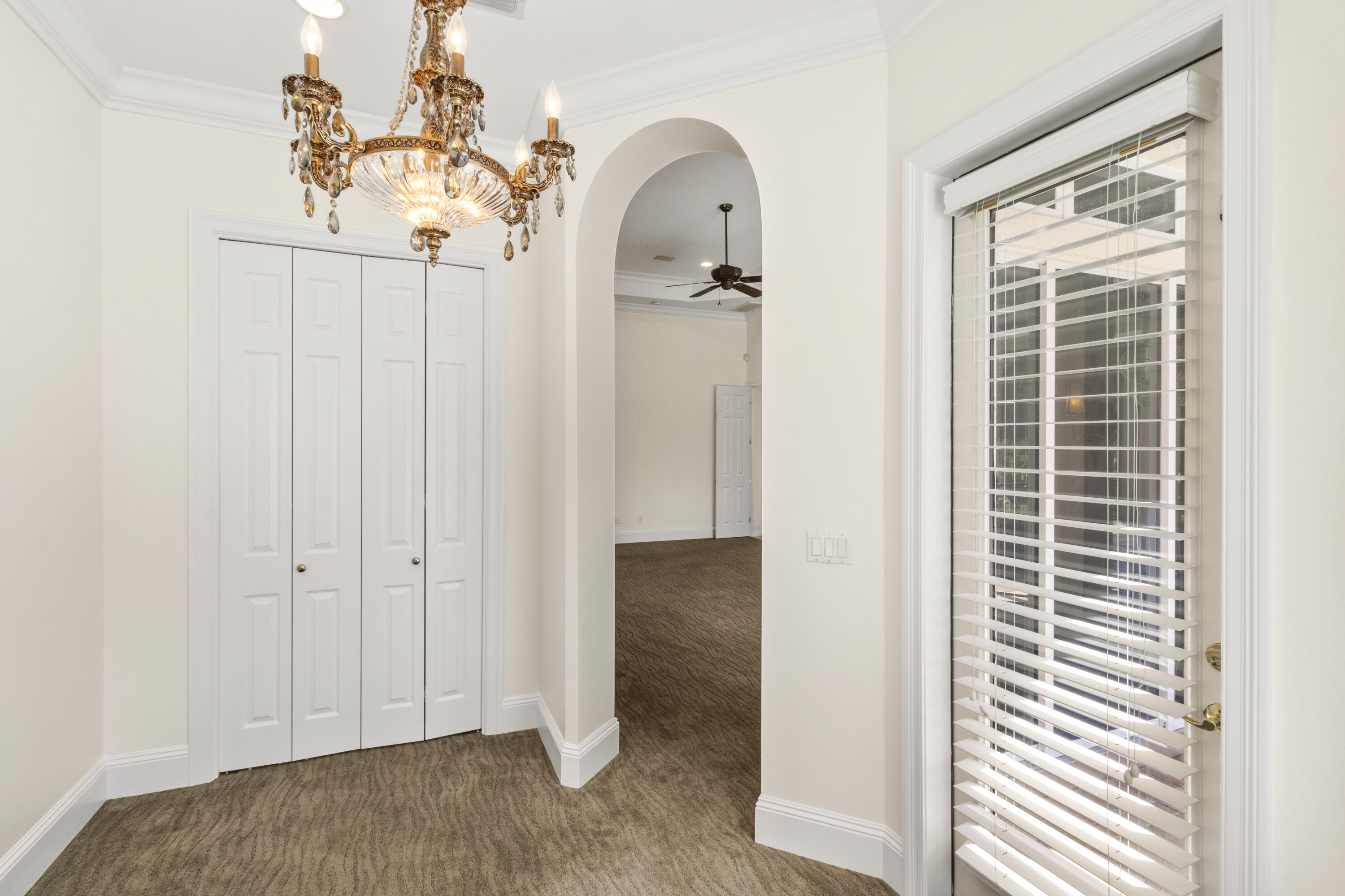 4304 Stonebridge Road Destin, FL 32541 - Photo 52 of 72 a view of a room that has a window and wooden floor