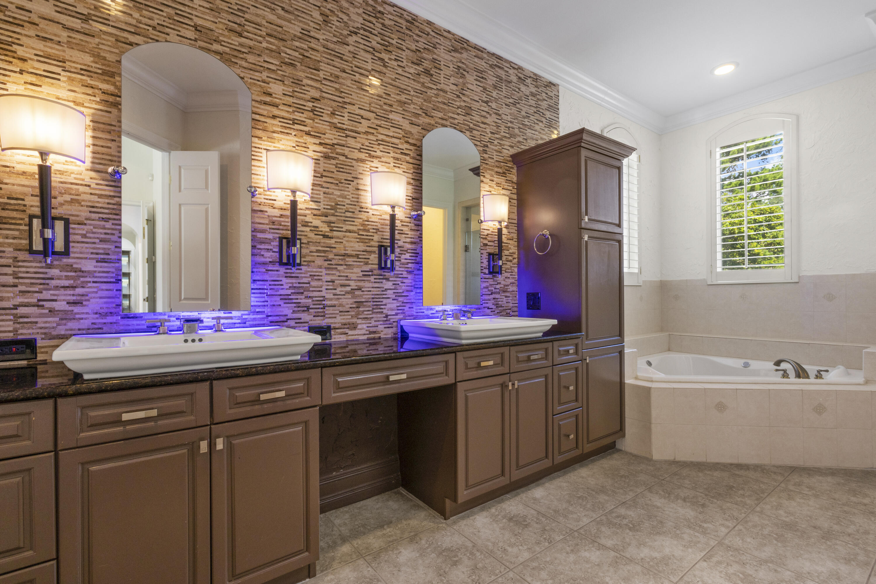 4304 Stonebridge Road Destin, FL 32541 - Photo 53 of 72 a bathroom with a double vanity sink and a mirror