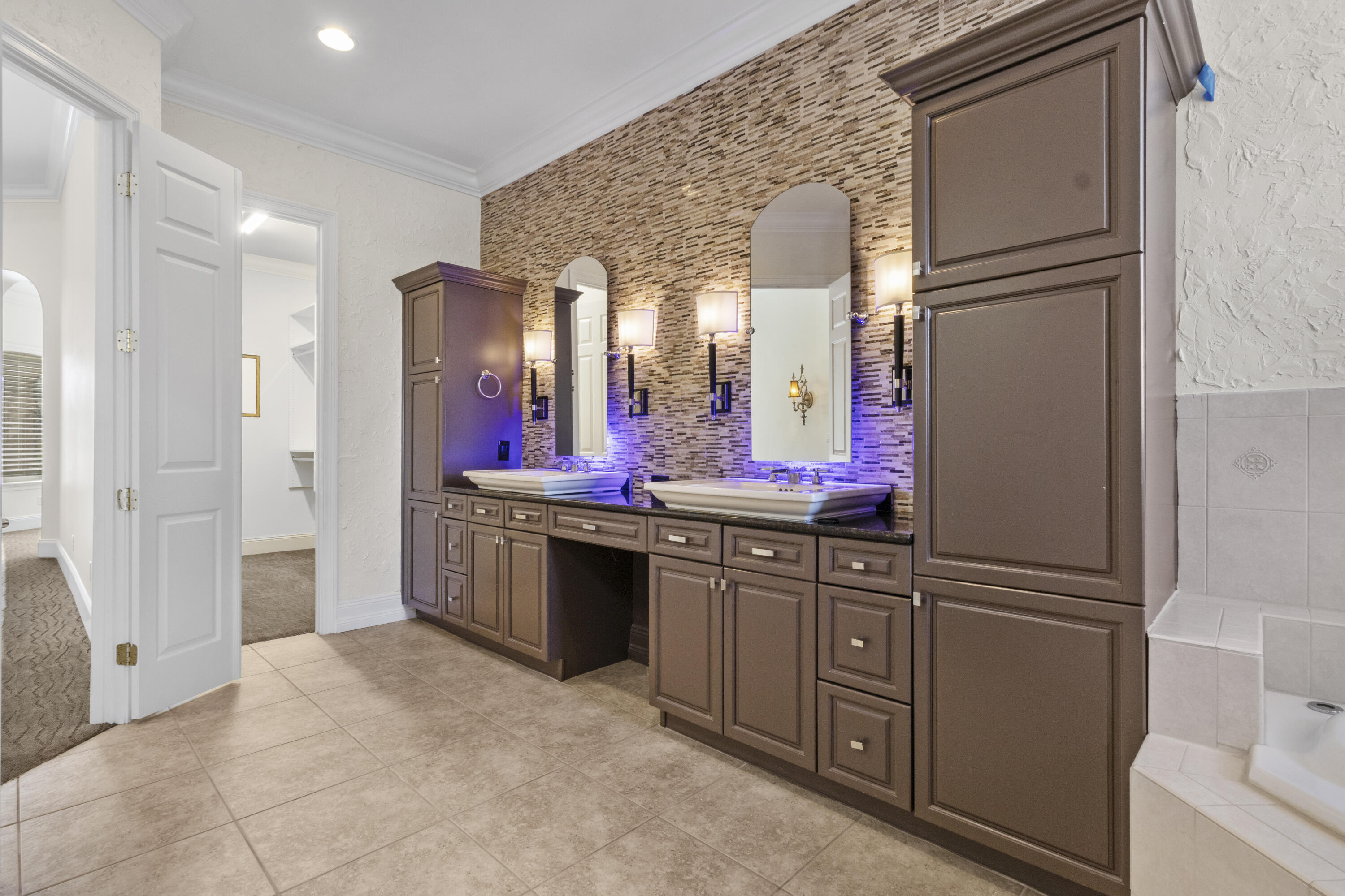 4304 Stonebridge Road Destin, FL 32541 - Photo 55 of 72 a kitchen with stainless steel appliances granite countertop a refrigerator and a sink