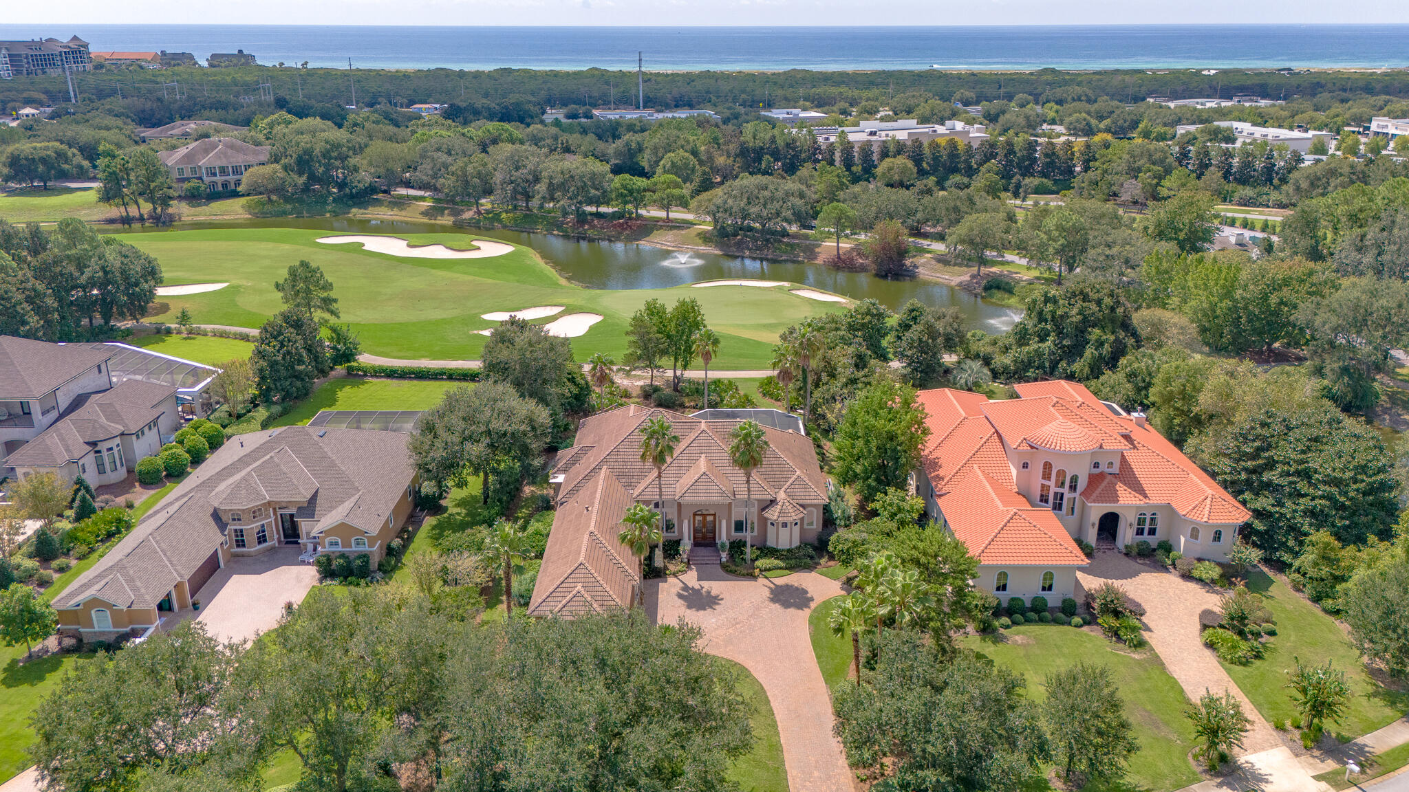 4304 Stonebridge Road Destin, FL 32541 - Photo 6 of 72 an aerial view of a houses with a lake view