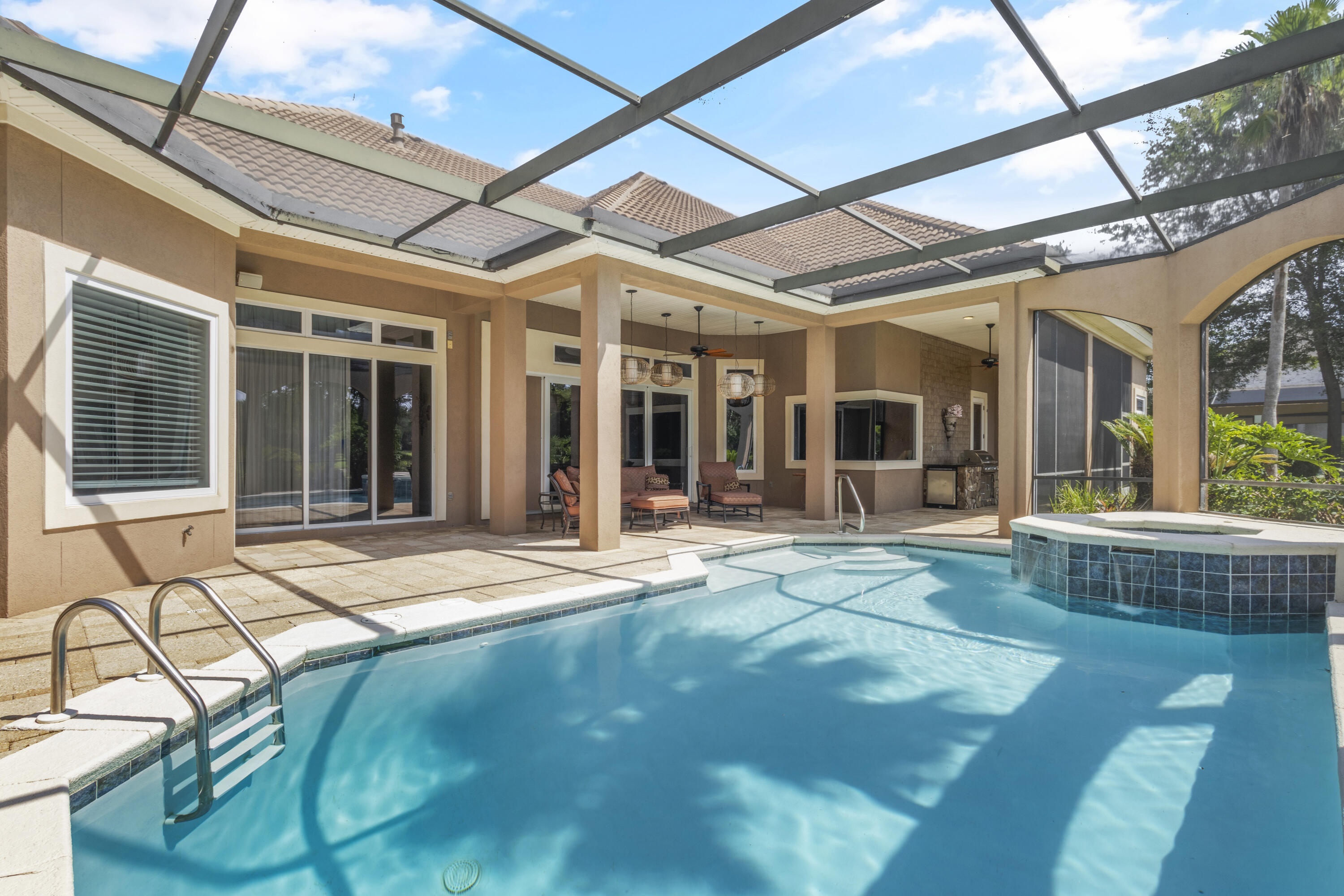 4304 Stonebridge Road Destin, FL 32541 - Photo 63 of 72 a swimming pool with patio outdoor seating and yard
