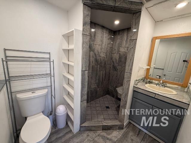 902 East Main Street Weiser, ID 83672 - Photo 35 of 45 Full bathroom with a shower stall and vanity