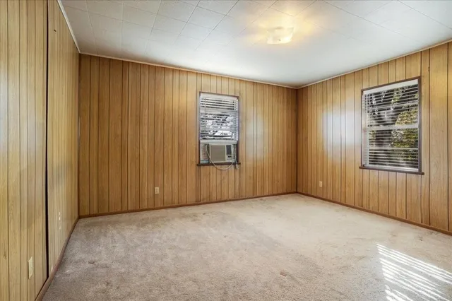 an empty room with windows