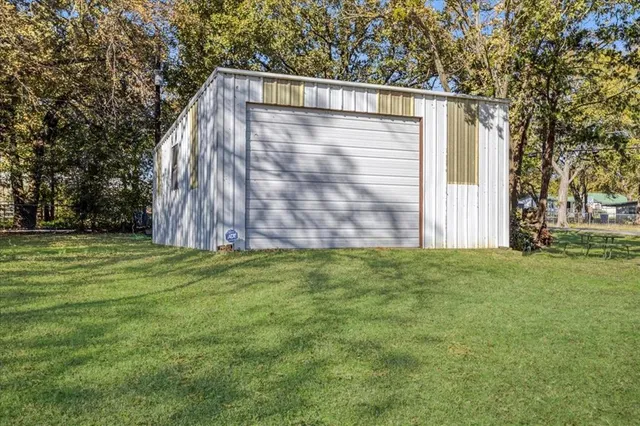 a view of a back yard of the house
