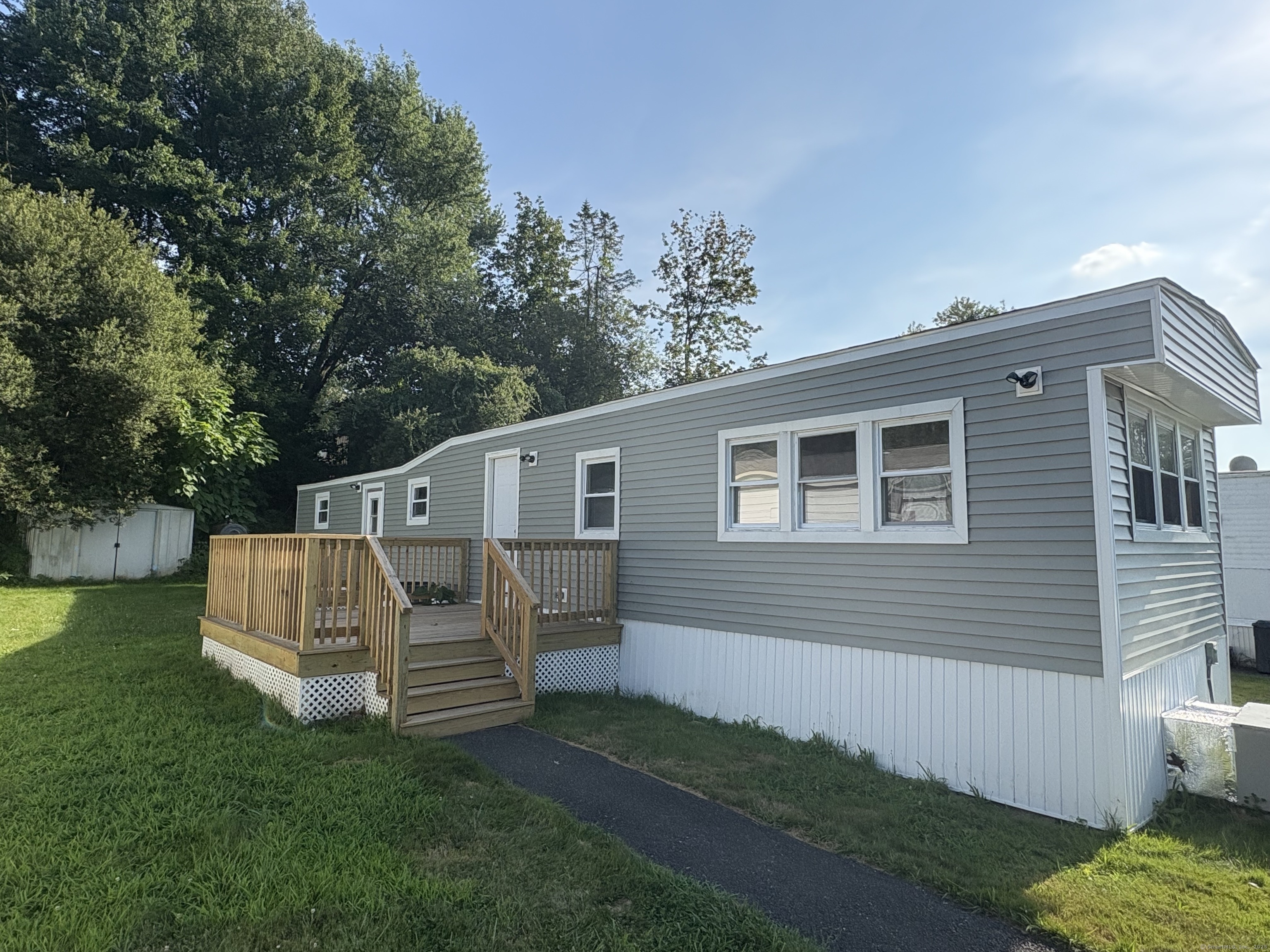 a view of a back yard of the house