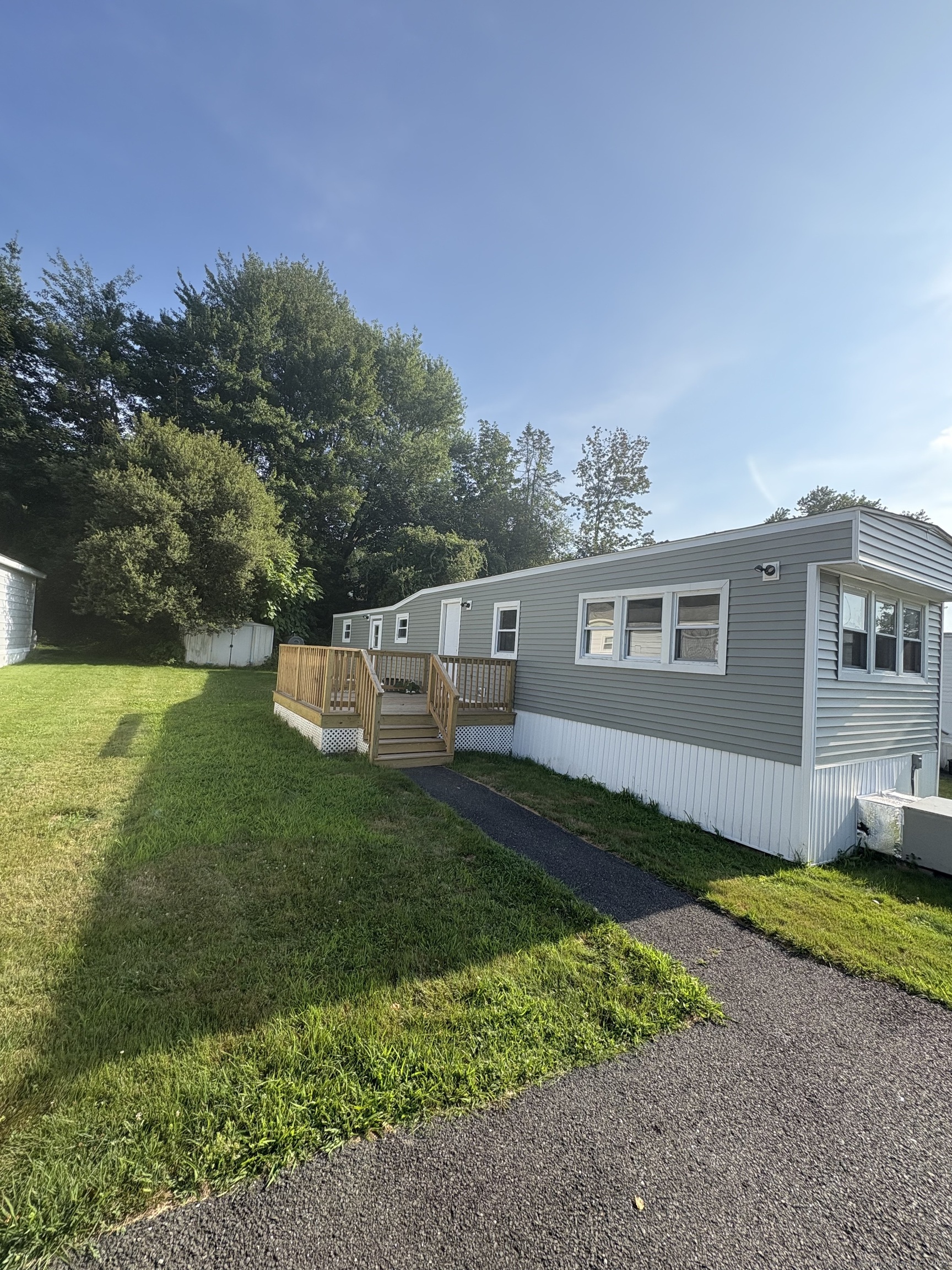 69 Nancy Lane Naugatuck, CT 06770 - Photo 2 of 10 a front view of a house with garden
