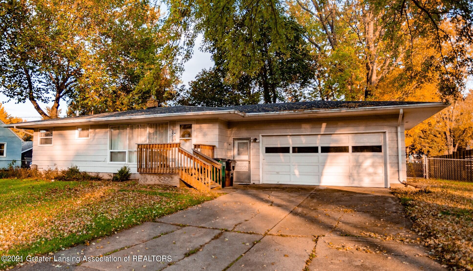 5719 Schafer Road Lansing, MI 48911 - Photo 1 of 18 Front