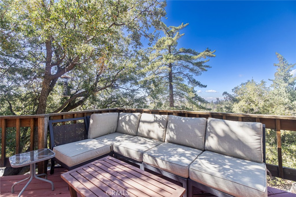 24387 Rocky Point Road Idyllwild, CA 92549 - Photo 20 of 29 a view of a couches in the roof deck