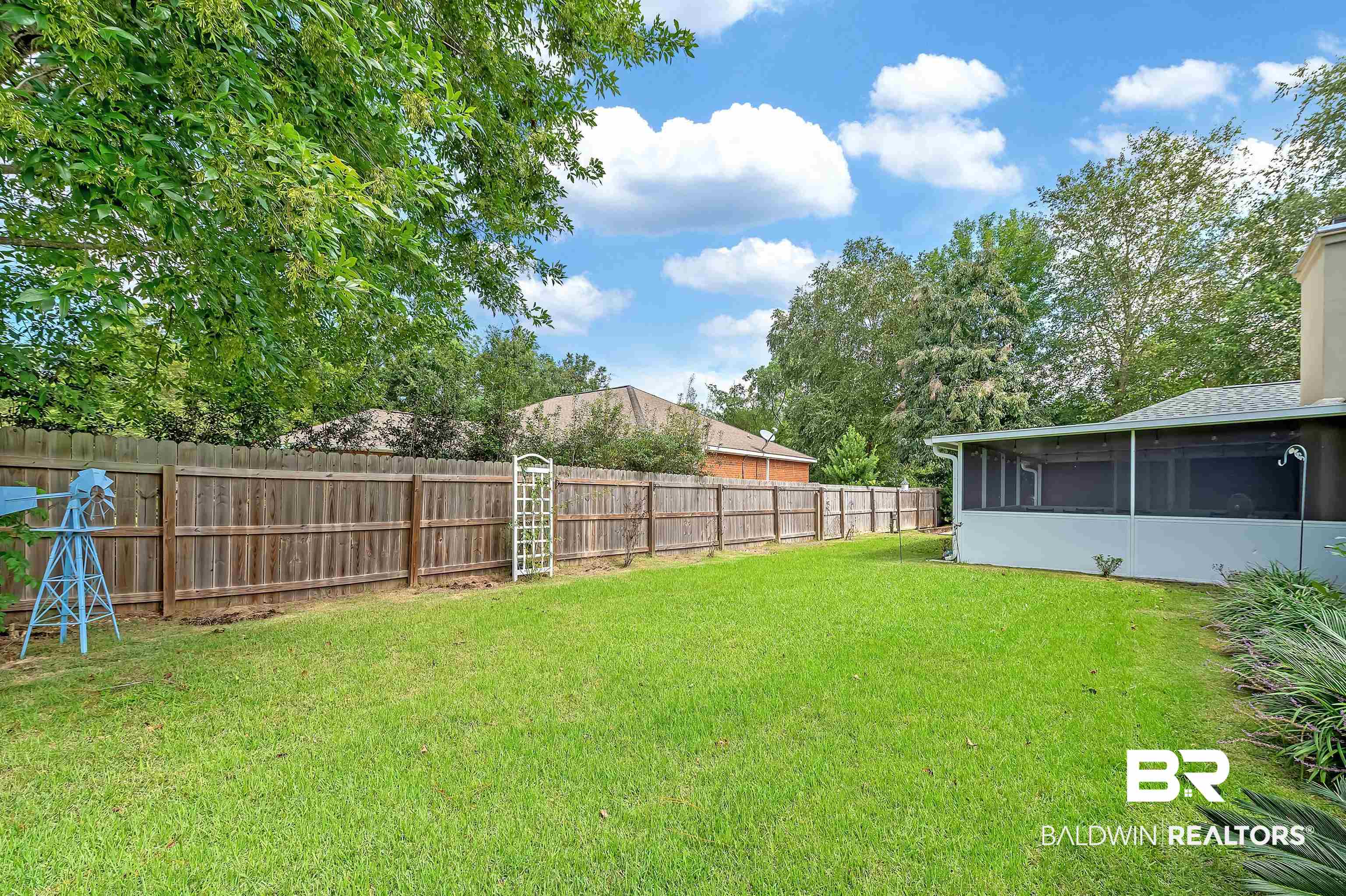9901 Glover Court Fairhope, AL 36532 - Photo 52 of 52 View of yard with a sunroom