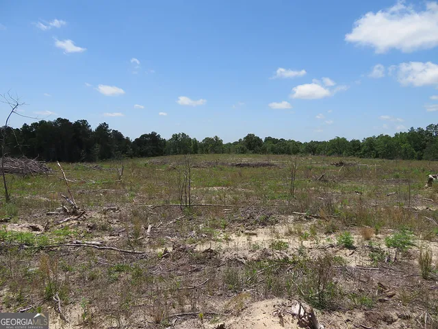 a view of a lake next to a building